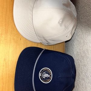 2 pack hat: Fear of God essentials ivory and melin dark blue golfer hat